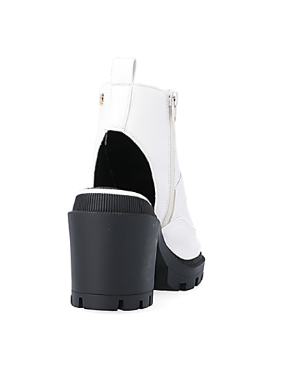 360 degree animation of product White open toe heeled ankle boots frame-10