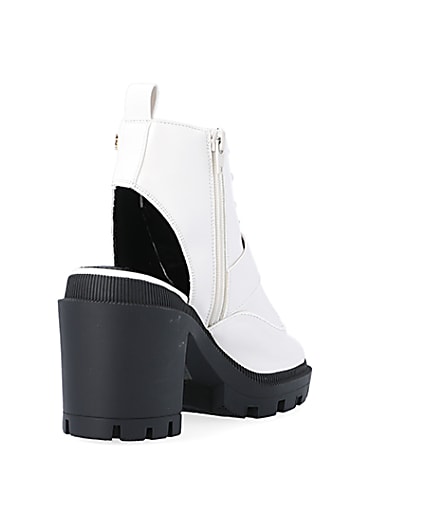 360 degree animation of product White open toe heeled ankle boots frame-11