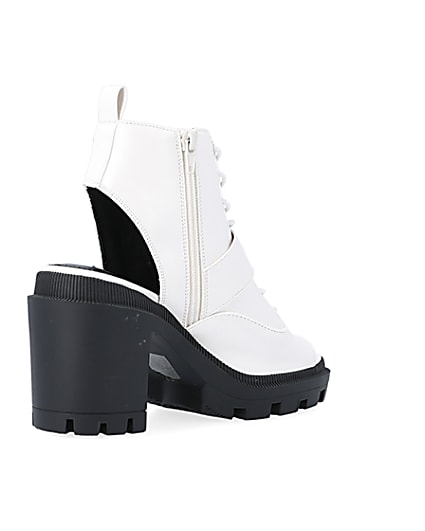 360 degree animation of product White open toe heeled ankle boots frame-12