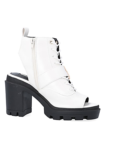 360 degree animation of product White open toe heeled ankle boots frame-16