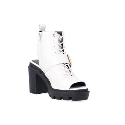 360 degree animation of product White open toe heeled ankle boots frame-18