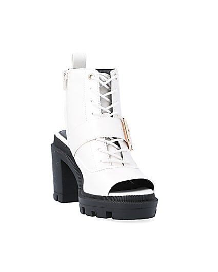360 degree animation of product White open toe heeled ankle boots frame-19