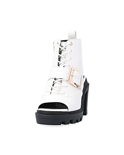 360 degree animation of product White open toe heeled ankle boots frame-22
