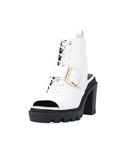 360 degree animation of product White open toe heeled ankle boots frame-23