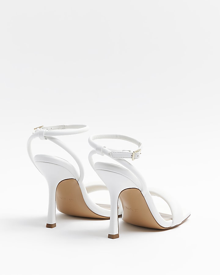 White padded heeled sandals
