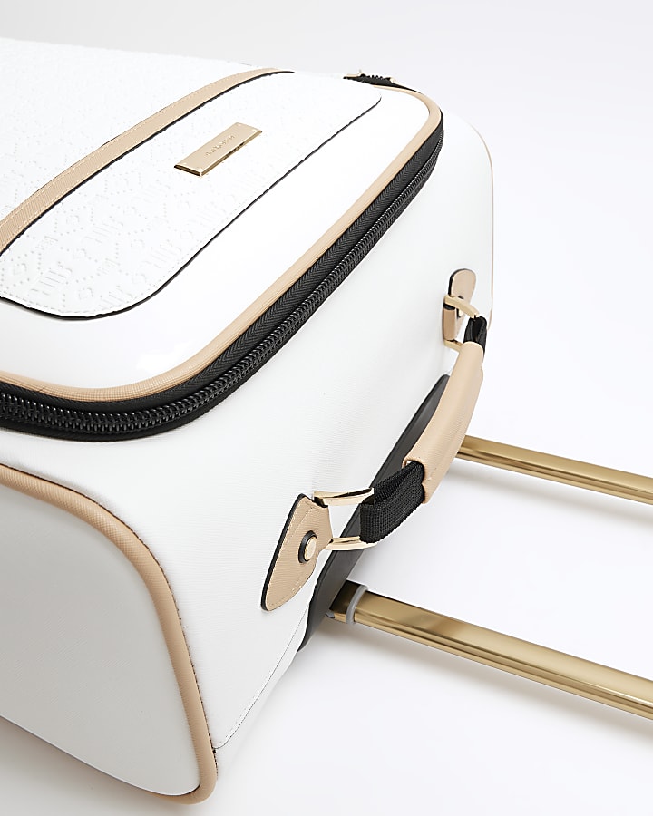White patent embossed suitcase