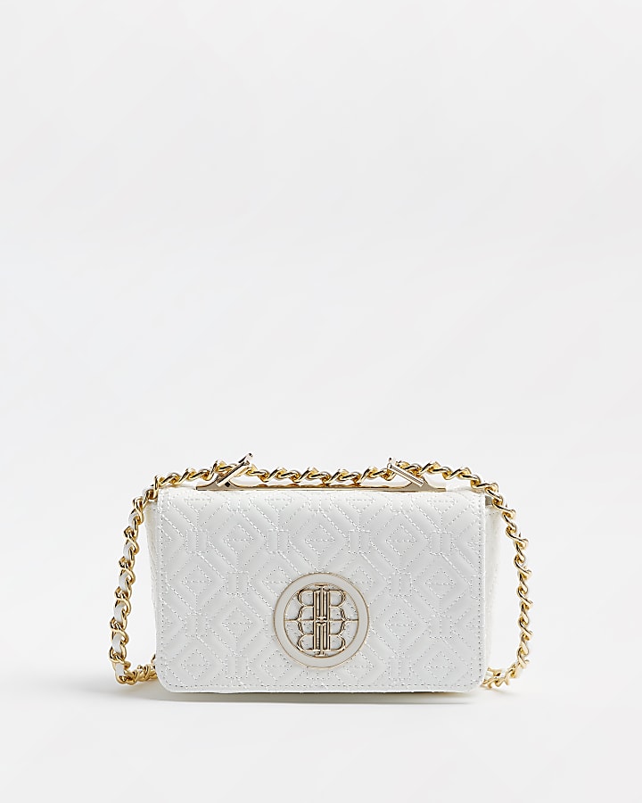 White patent quilted cross body bag | River Island