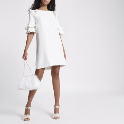 White pearl neck frill sleeve swing dress