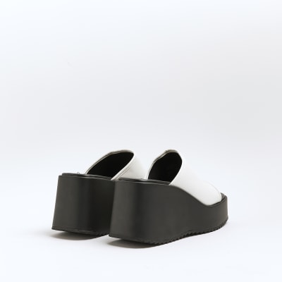 White platform mules