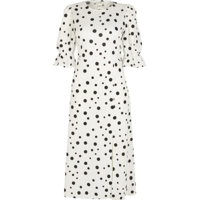 white dress with black dots