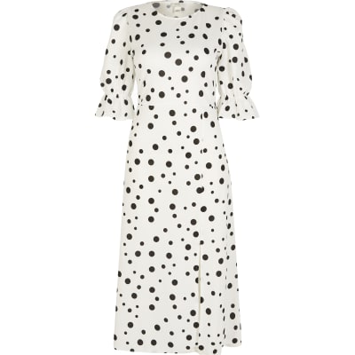 white spotty midi dress