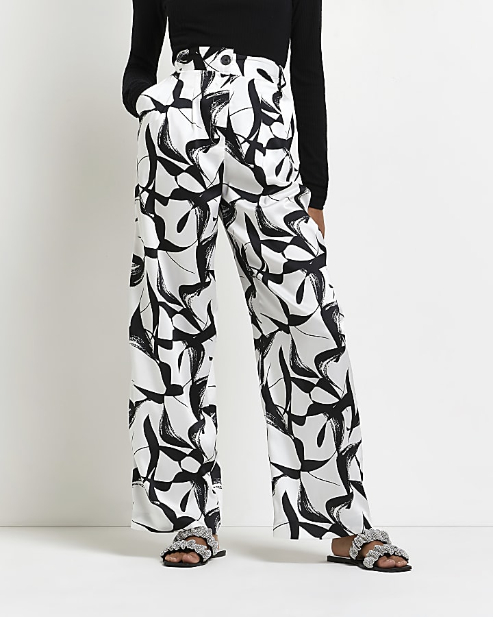 White printed wide leg pleated trousers