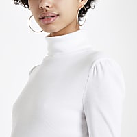 White puff sleeve turtle neck top