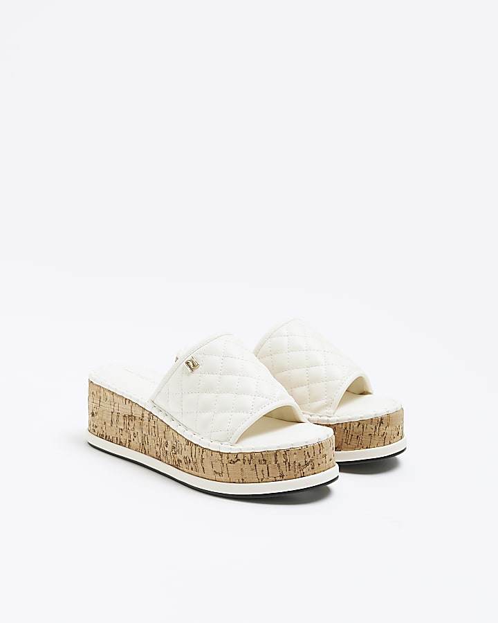 White quilted platform sandals