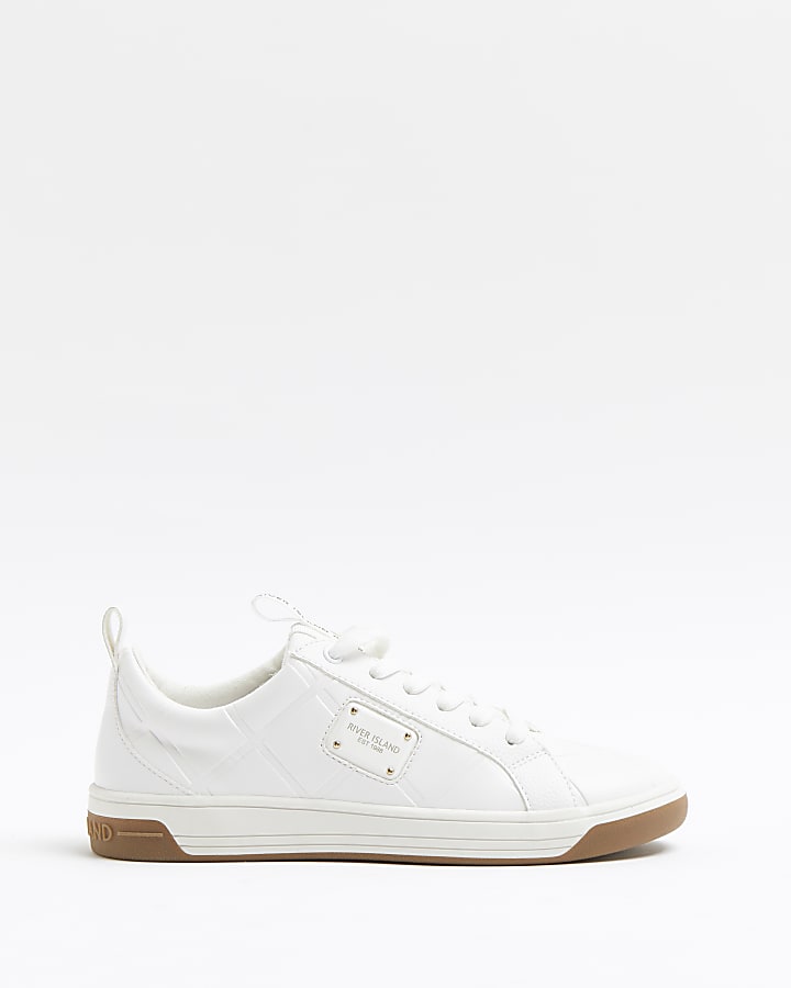 White quilted trainers