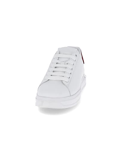 360 degree animation of product White red back tab trainers frame-22