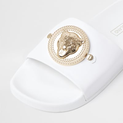 White RI embossed charm front sliders