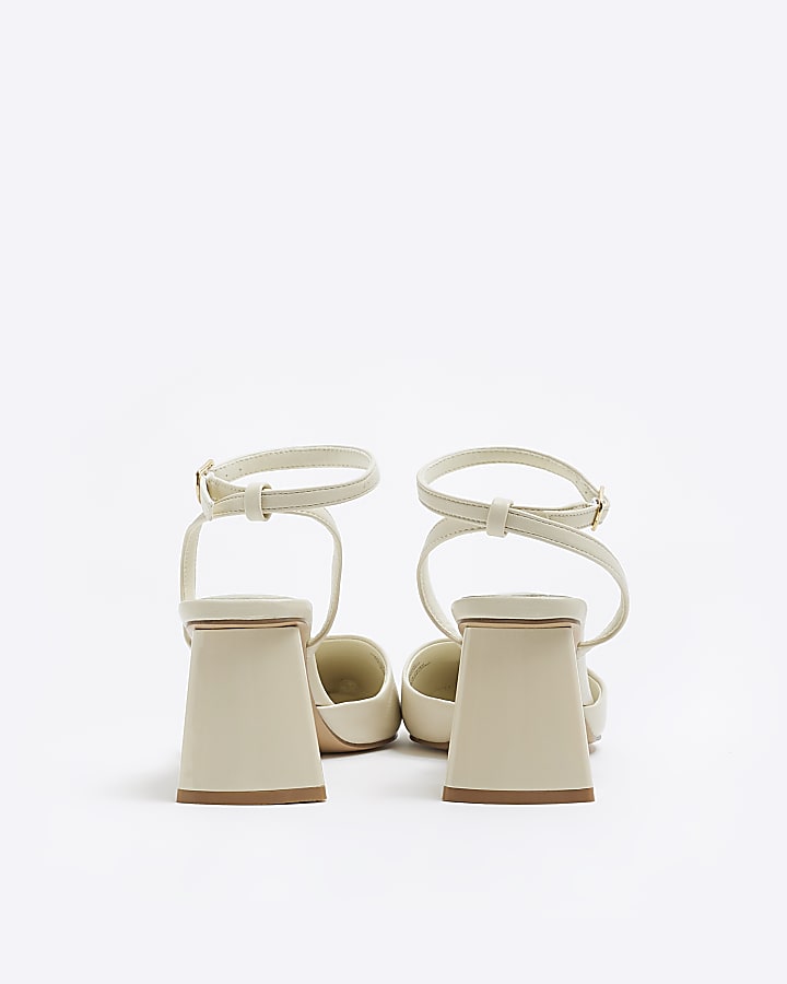 White sling back block heel court shoes