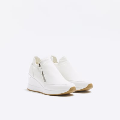 White slip on wedge trainers | River Island