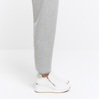 White slip on wedge trainers | River Island