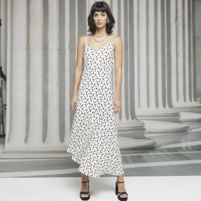 White Spot Asymmetric Hem Slip Dress River Island