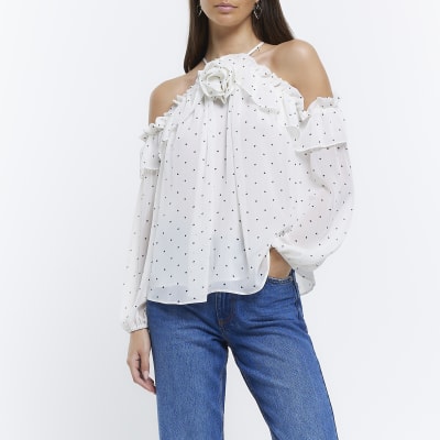 White spot cold shoulder corsage blouse