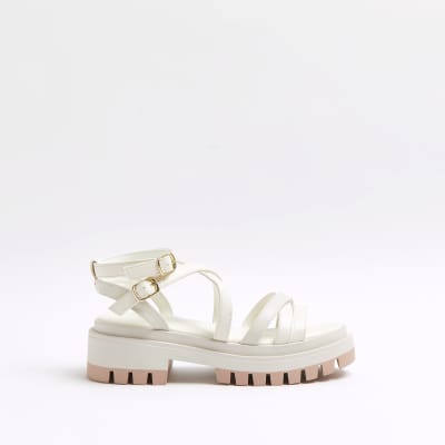 white strappy flatforms