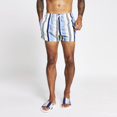 blue and white striped swim shorts