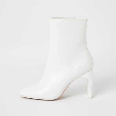 white heeled boots