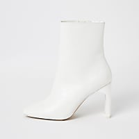 White textured high heel boots