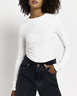 White textured long sleeve top