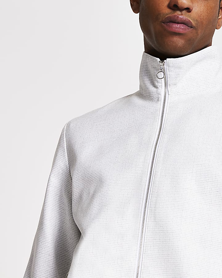 White textured zip front funnel neck jacket