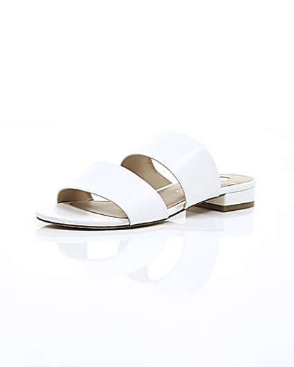 360 degree animation of product White two strap mules frame-0