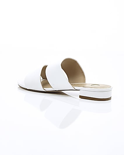 360 degree animation of product White two strap mules frame-19