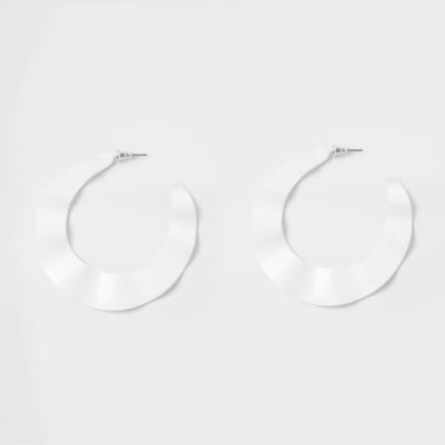 White wavy hoop earrings