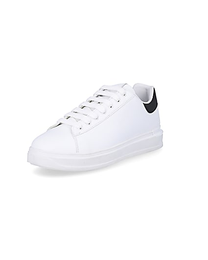 360 degree animation of product White wedge trainers frame-0