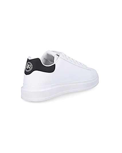 360 degree animation of product White wedge trainers frame-12