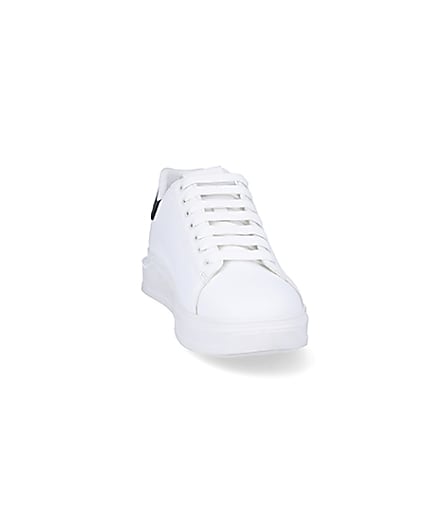 360 degree animation of product White wedge trainers frame-20