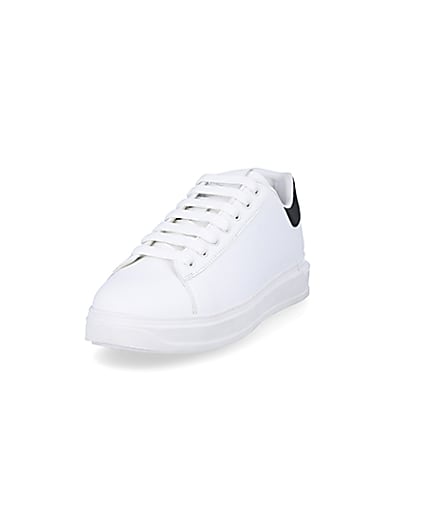 360 degree animation of product White wedge trainers frame-23