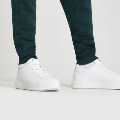 white trainers with black back