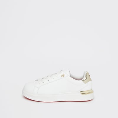 white trainers with gold back