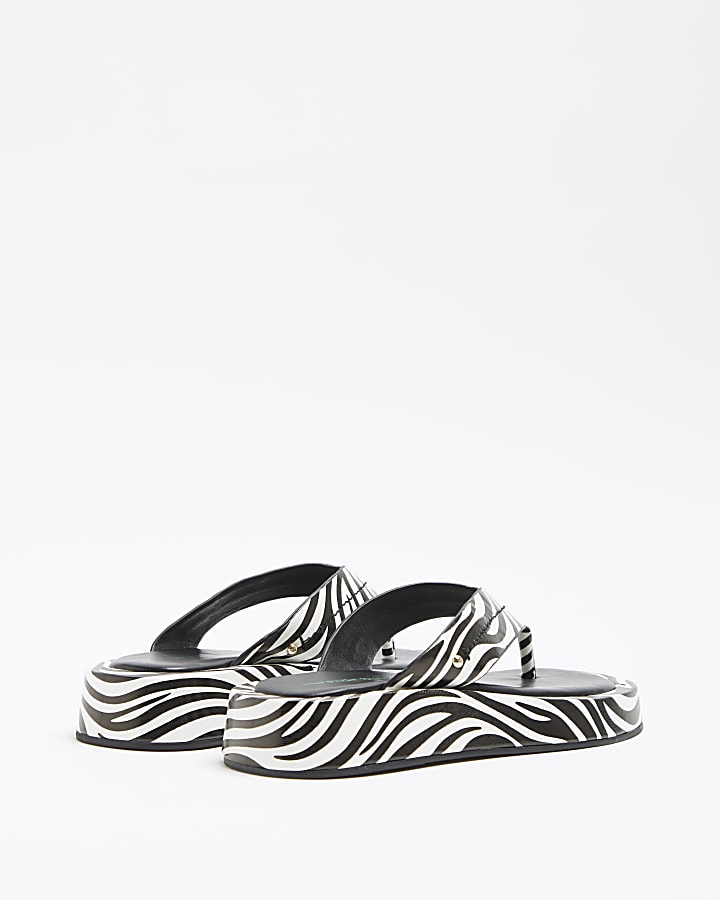White zebra print flatform sandals