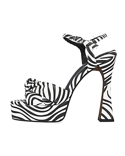 360 degree animation of product White zebra print knot detail platform heels frame-3