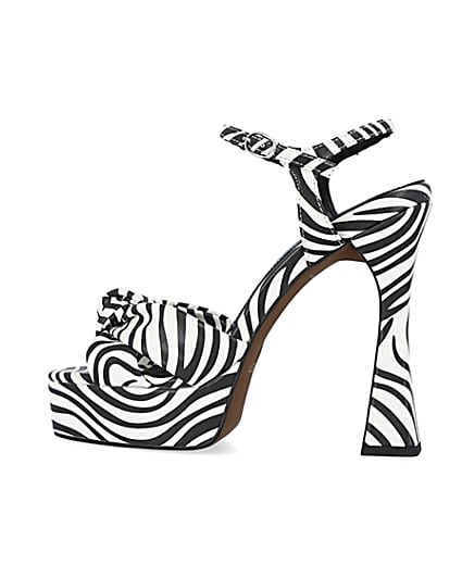 360 degree animation of product White zebra print knot detail platform heels frame-4