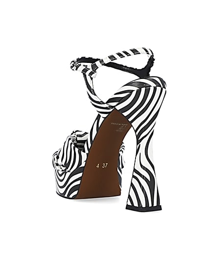 360 degree animation of product White zebra print knot detail platform heels frame-7