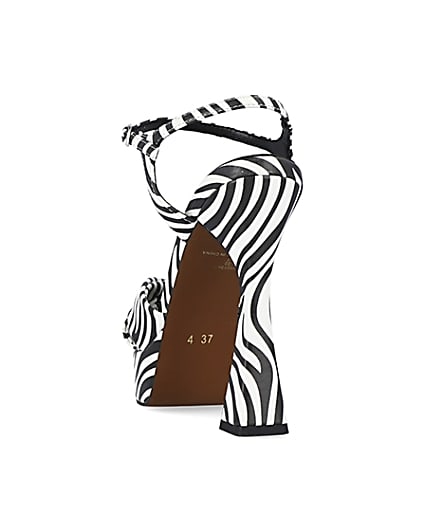 360 degree animation of product White zebra print knot detail platform heels frame-8