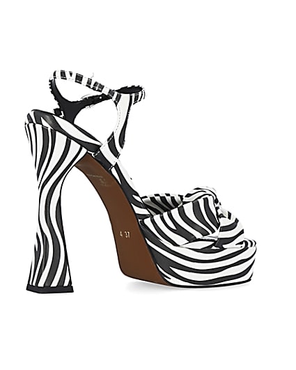360 degree animation of product White zebra print knot detail platform heels frame-13