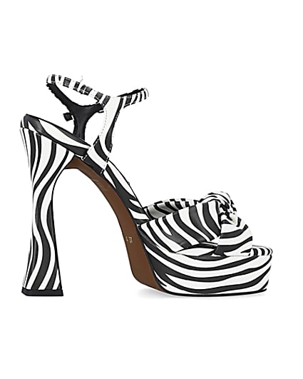 360 degree animation of product White zebra print knot detail platform heels frame-14