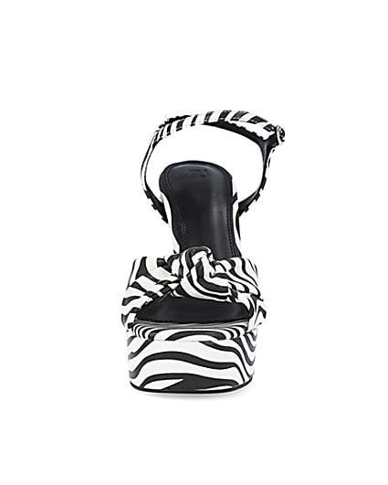 360 degree animation of product White zebra print knot detail platform heels frame-21