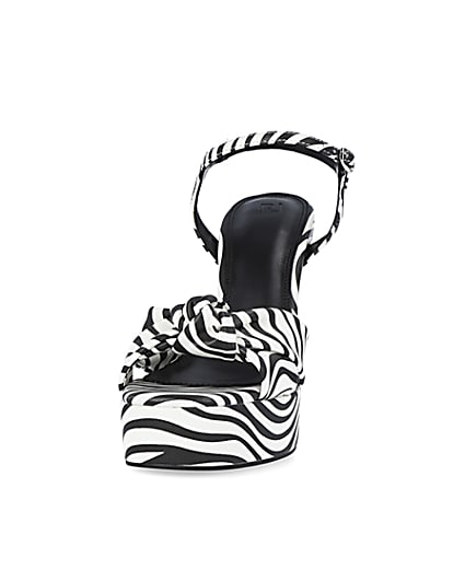 360 degree animation of product White zebra print knot detail platform heels frame-22